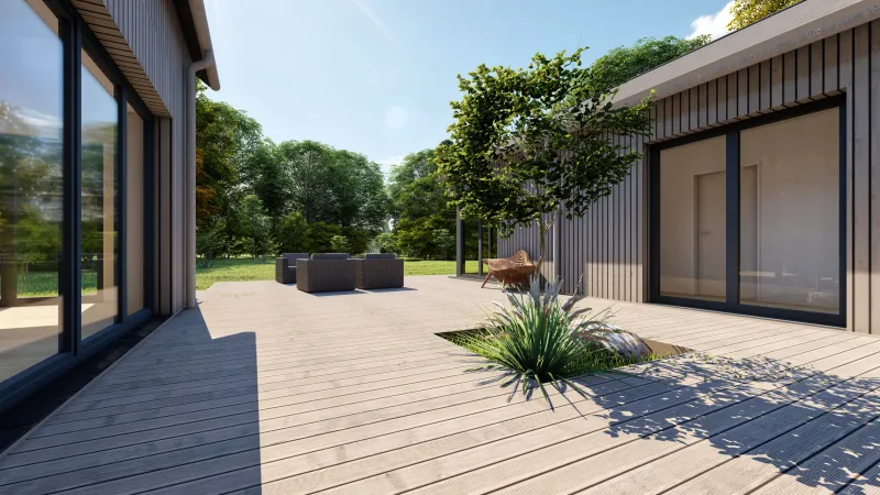 Holzterrasse mit Lounge-Bereich und Begrünung im Innenhof eines modernen Holzrahmenhauses – nachhaltiges Wohnen im skandinavischen Stil.